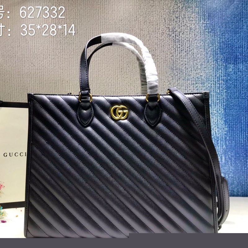 G*u*i shopping bags